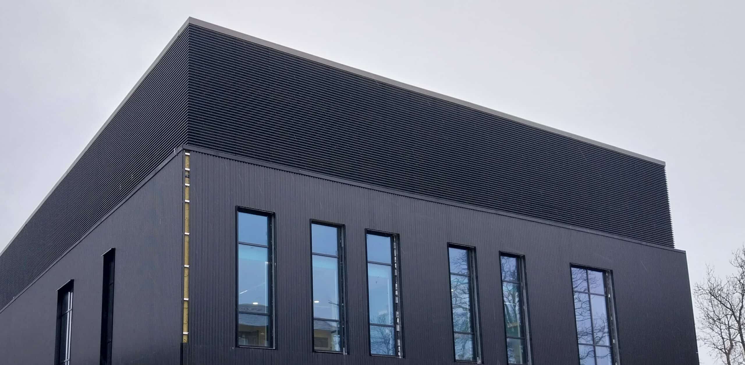 Exterior building shot of NHS St Lukes Bradfords unit featuring Gilberts louvres.